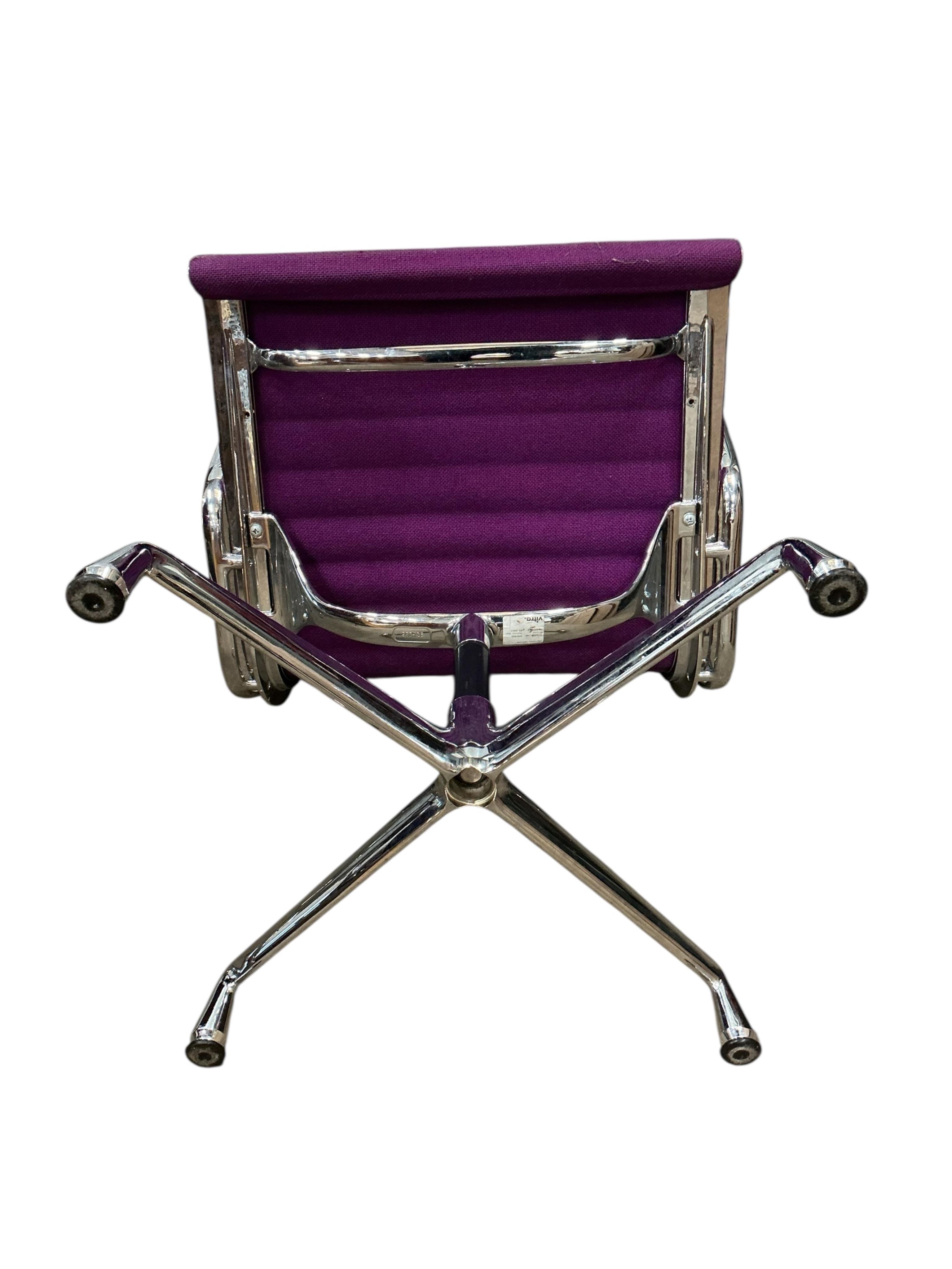 Charles Eames for Vitra, a chrome swivel desk chair on four prong base, width 57cm, depth 50cm, height 82cm